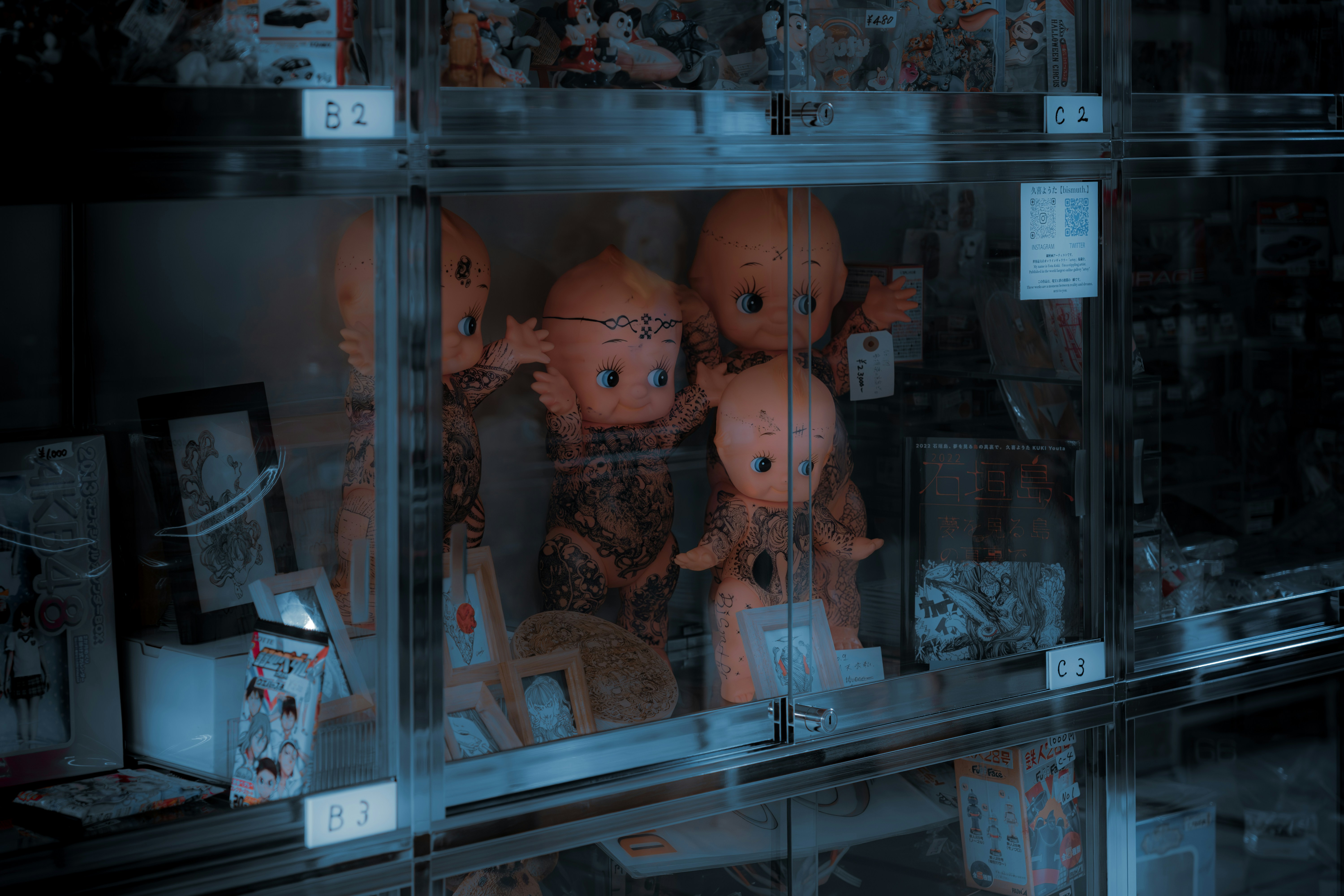 a display case filled with lots of stuffed animals